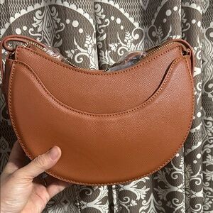 Crossbody Shoulder Handbag with Adjustable Strap & Tassel. Size 9x3x6 “